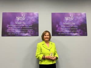 Rita Canning with her Lifetime Achievement Purple Ribbon Award