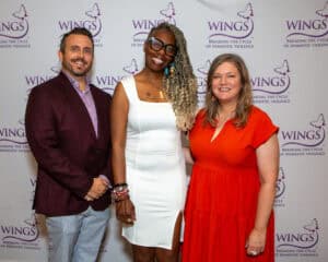 Anthony Pasquini, member of WINGS Board of Directors; VersAnnette Blackman, WINGS Graduate; Ericka Swanson, WINGS staff.