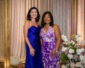 From left: WINGS President and CEO Rebecca Darr and WINGS Board Chair Ellaine Sambo-Reyther at last year’s Purple Tie Ball